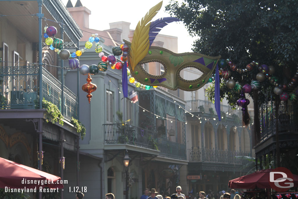 Christmas decorations have been removed from New Orleans Square.  The mask has remained, assuming for Mardi Gras