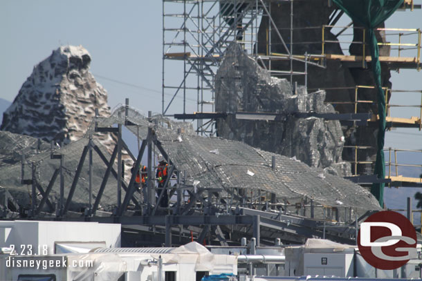 Crews working on assembling the mesh on this section.