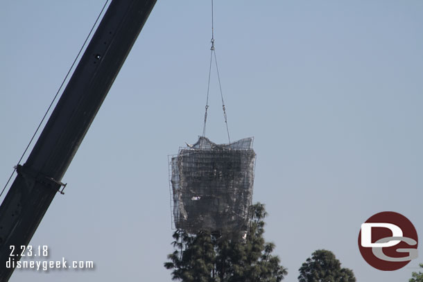 More wire mesh being lifted into place.