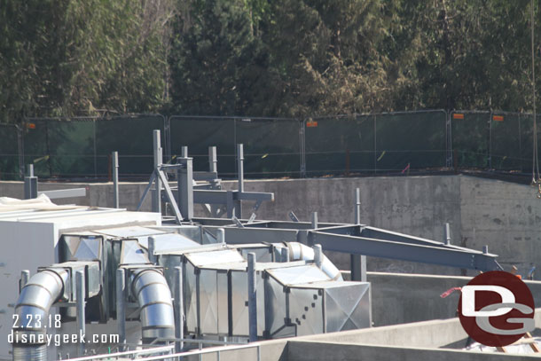 Steel rising over the top of the concrete building near the Battle Escape building.