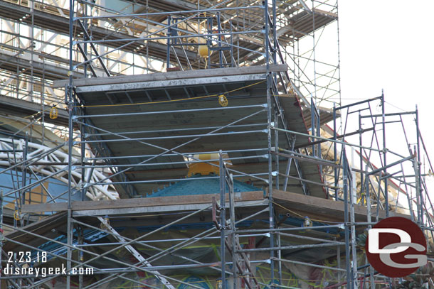 The Toy Story Buildings are going from red to blue it appears.  (to mirror the change of the coaster from blue to red).