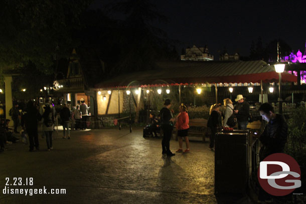 The former location has some benches, guessing to allow a place to eat as well as better flow for the FastPass area.