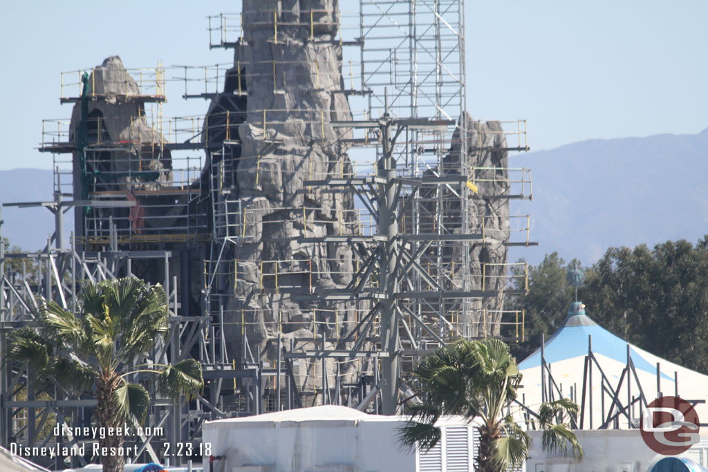 More steel support structures rising in the foreground.