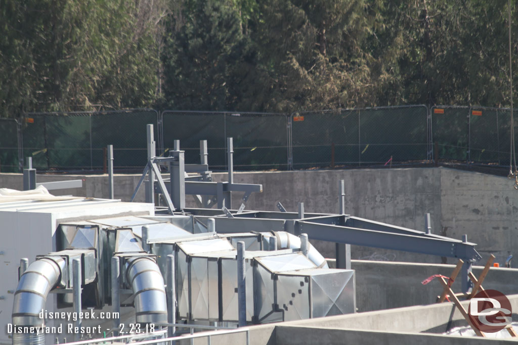 Steel rising over the top of the concrete building near the Battle Escape building.