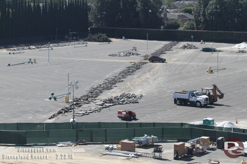 A closer look.  The light poles are down and some concrete removal has started.