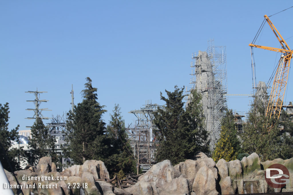 Between the trees you can see the steel for the structure in the village that we saw the top of from the garage.