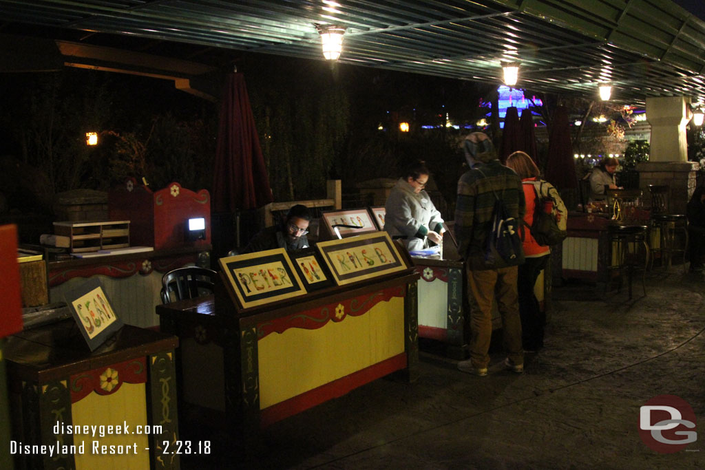 The art tables/kiosk have moved to the former smoking area under the monorail beam.