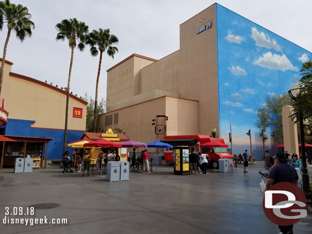 A merchandise location, marketplace and food truck in this courtyard.