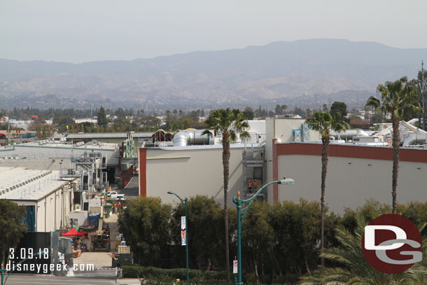 A tighter pan now starting on the left with the Millennium Falcon show building.  More of the red border has been added  to the building.  Not a lot of other visible progress from this distance/angle.