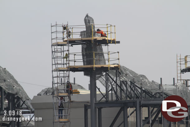 A crew working on this peak.  Another team was lifting scaffolding pieces into place below.