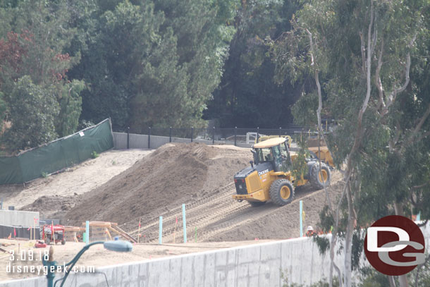 A closer look at the front end loader on the far berm.