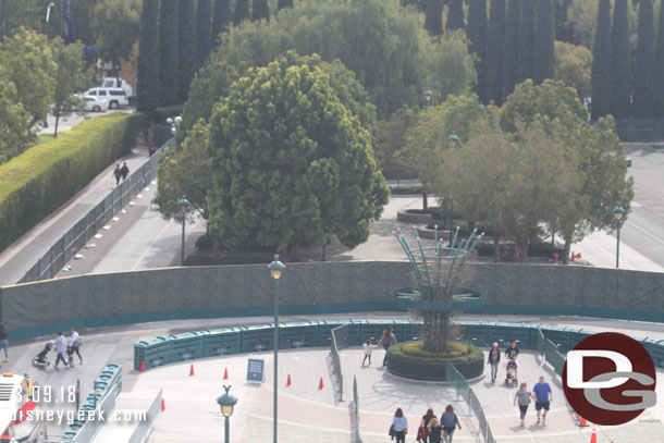 Here you can see a new wall that divides the old stop and marks the current/temporary path.  On the far left along the hedges is a new walkway to reach Magic Way and Disneyland Drive.