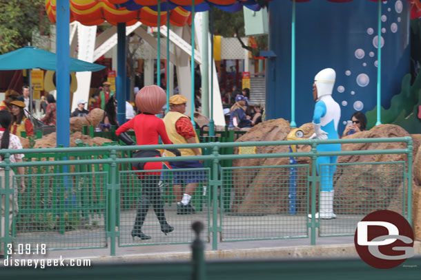 Mrs Incredible and Frozone roaming Paradise Pier.