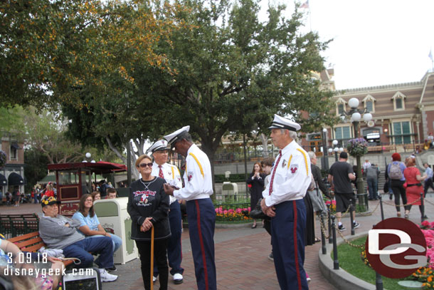 Presenting a challenge coin before the Flag Retreat Ceremony.