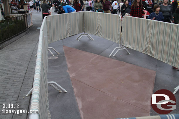 Some parade route work going on in the Small World Mall.  The new concrete is no where near the color of the original.