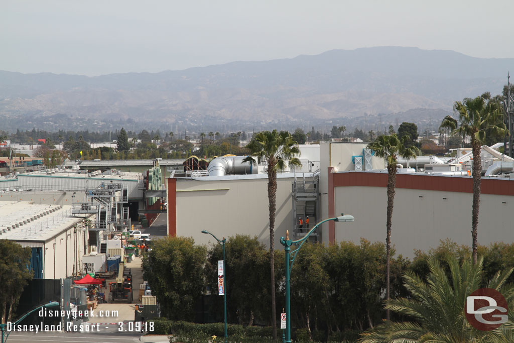 A tighter pan now starting on the left with the Millennium Falcon show building.  More of the red border has been added  to the building.  Not a lot of other visible progress from this distance/angle.