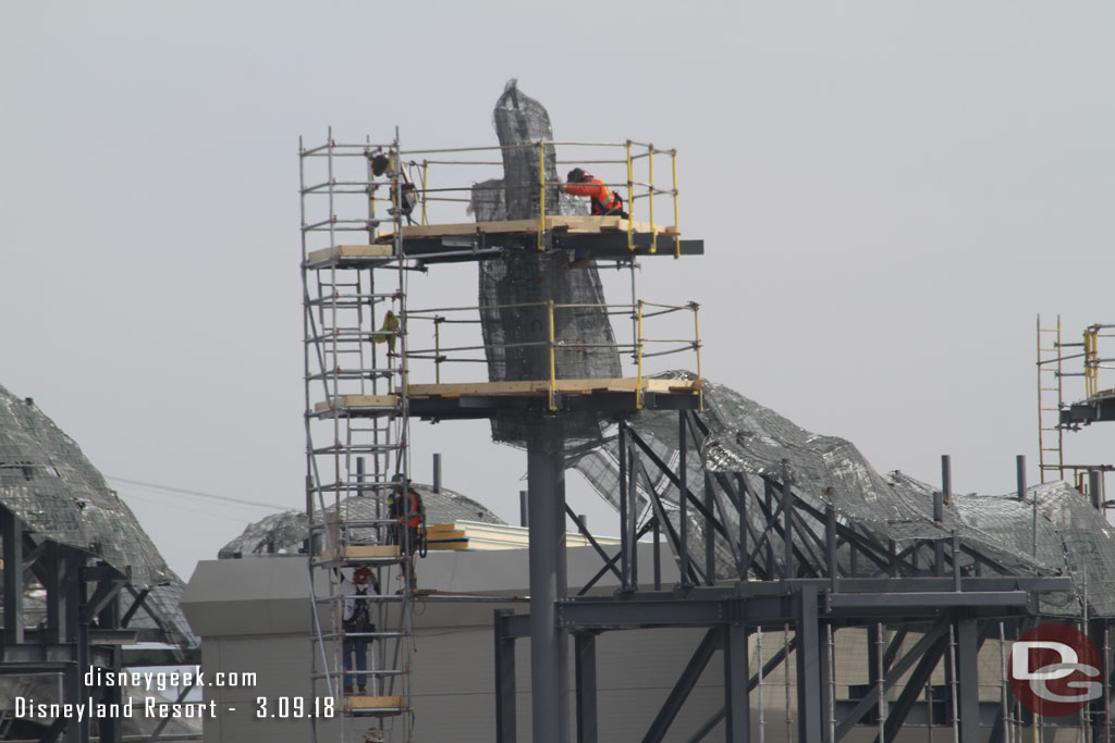 A crew working on this peak.  Another team was lifting scaffolding pieces into place below.