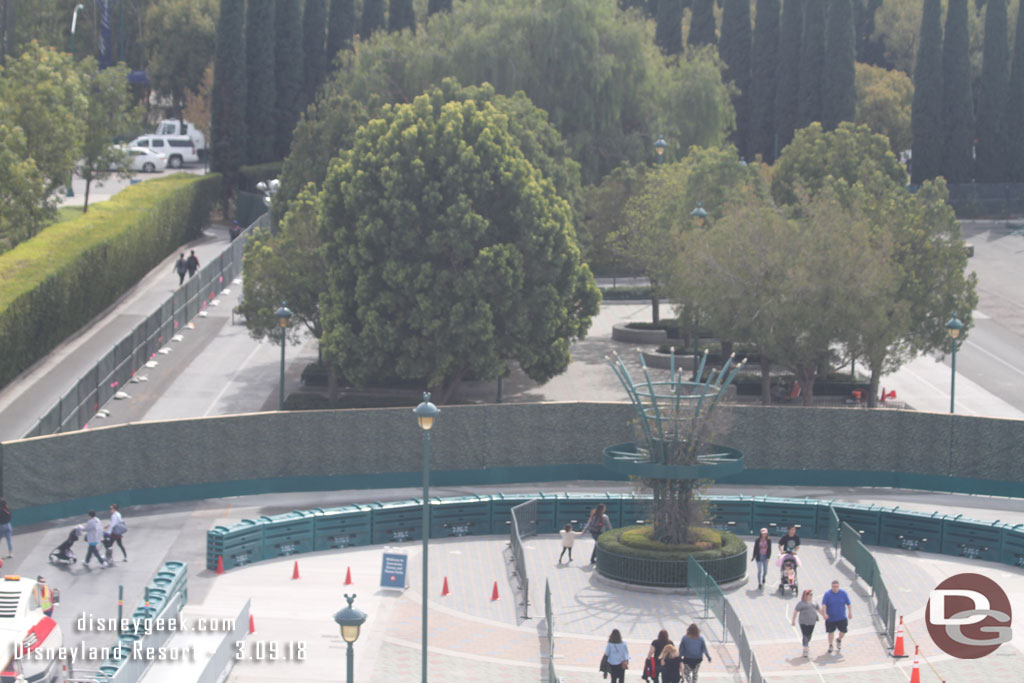 Here you can see a new wall that divides the old stop and marks the current/temporary path.  On the far left along the hedges is a new walkway to reach Magic Way and Disneyland Drive.