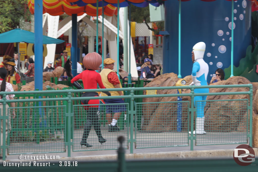 Mrs Incredible and Frozone roaming Paradise Pier.