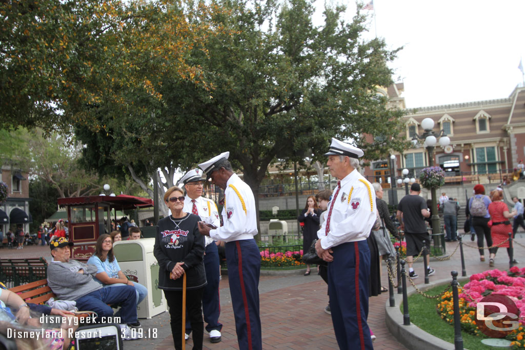 Presenting a challenge coin before the Flag Retreat Ceremony.