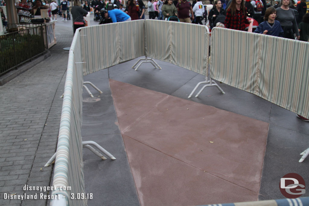 Some parade route work going on in the Small World Mall.  The new concrete is no where near the color of the original.