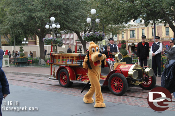 Pluto walking around Town Square.  The fire truck was out as a photo op.