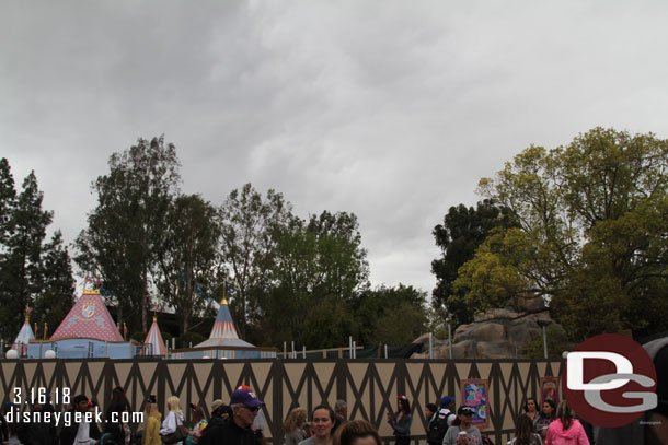 The new shade structure for Dumbo is starting to rise up. You can see poles above the wall now.