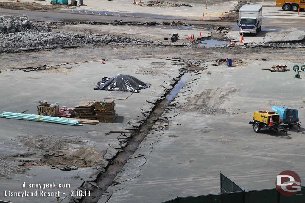 The concrete in the former drainage ditch/path has been removed.