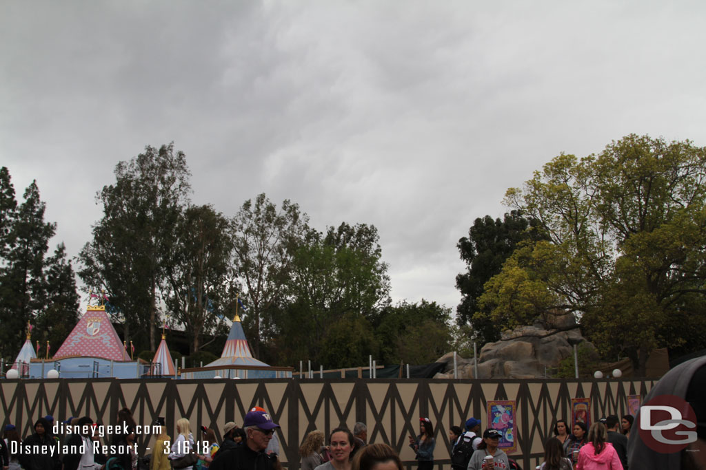 The new shade structure for Dumbo is starting to rise up. You can see poles above the wall now.