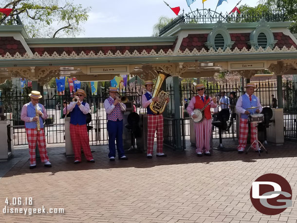 The Straw Hatters performing near the exit.