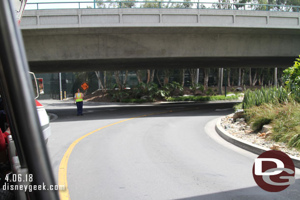 A cast member controlling traffic.