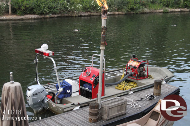 The emergency boat for Fantasmic was docked near the canoes.