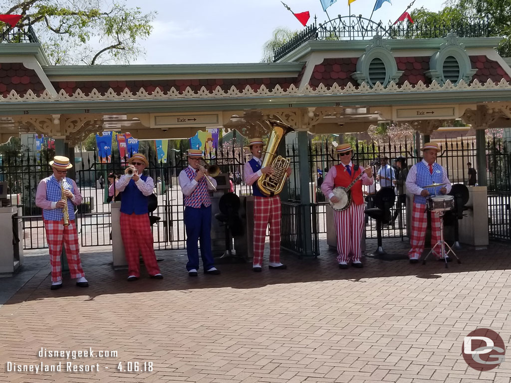 The Straw Hatters performing near the exit.