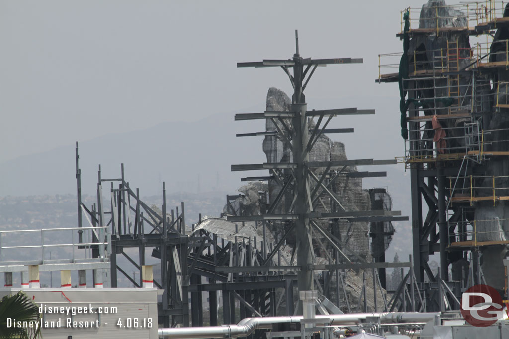 Wire mesh is being added to the steel erected in the foreground when looking toward the three original peaks.