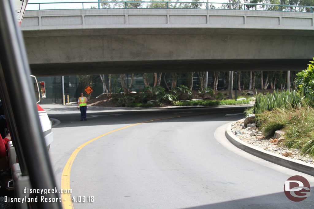 A cast member controlling traffic.