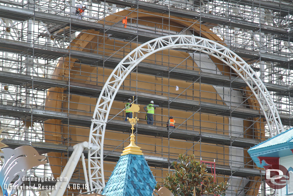 A team working on the coaster loop backdrop.