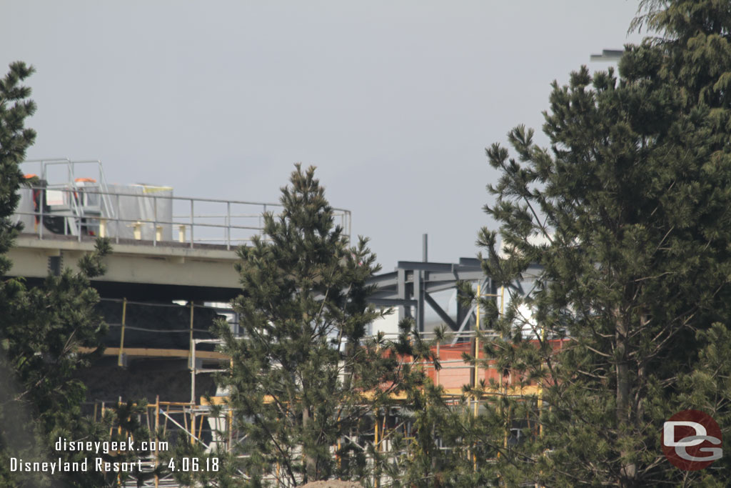 Through the trees you can see a lot of steel in the marketplace/village area.