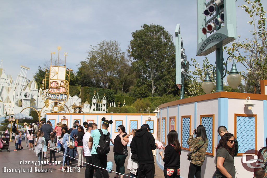 The walls are still up for the parade route and queue project near small world.