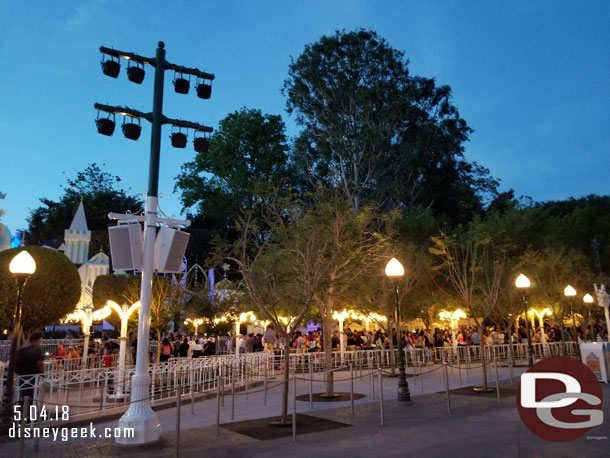 A look around the new it's a small world queue area after dark.