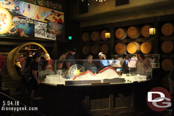 In the center of the cellar is a model of Pixar Pier.