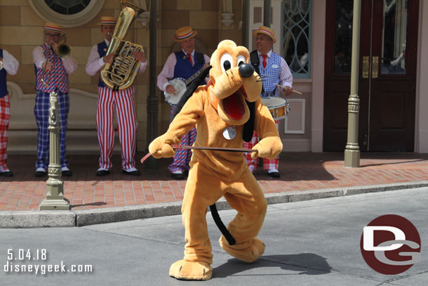 Next stop Disneyland.  The Straw Hatters were performing and characters were joining them.  Pluto was dancing as I arrived.