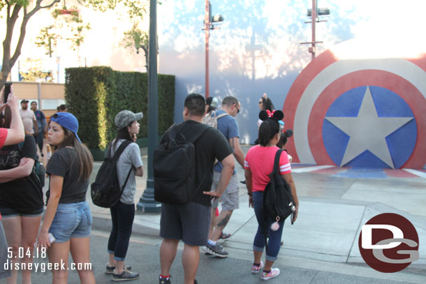 No sign of Captain America but a line of guests waiting to take their picture in front of his backdrop.