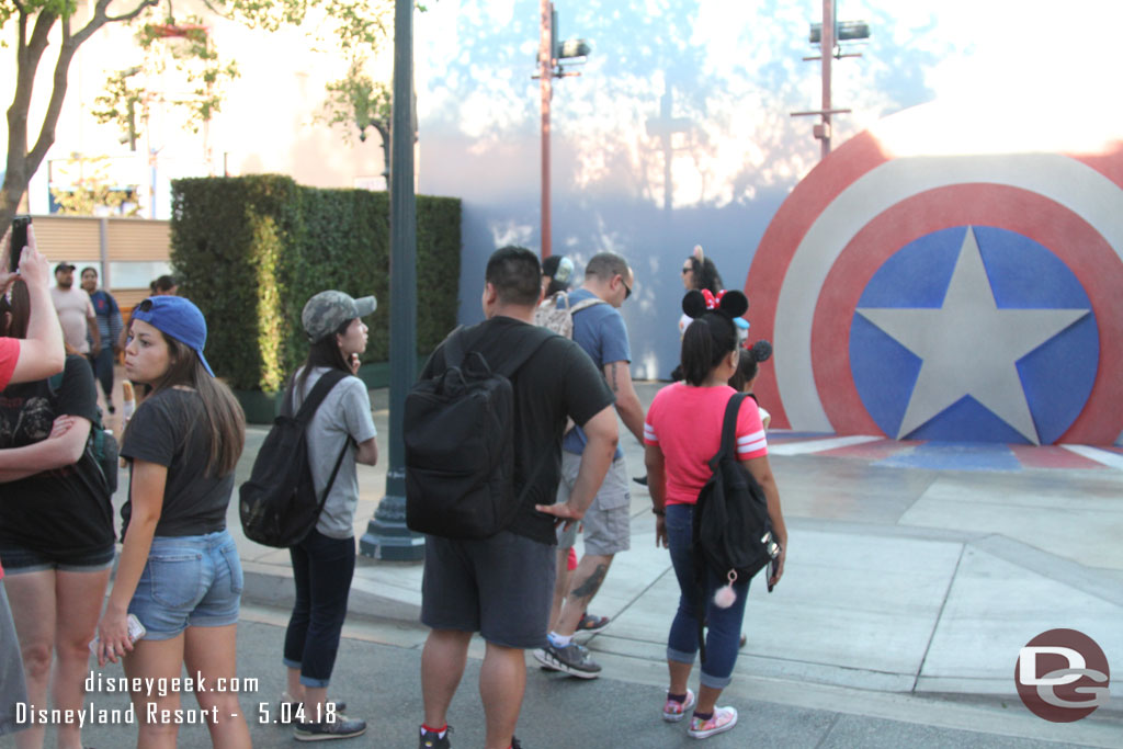 No sign of Captain America but a line of guests waiting to take their picture in front of his backdrop.