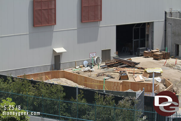 Looks like forms going in for something behind the Battle Escape building.  Hard to tell if it will be a structure or a pad or something else from this angle.