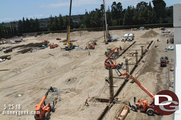 They have started to install the support columns.  Here you can see a trench that has been dug and the first vertical columns being set up.