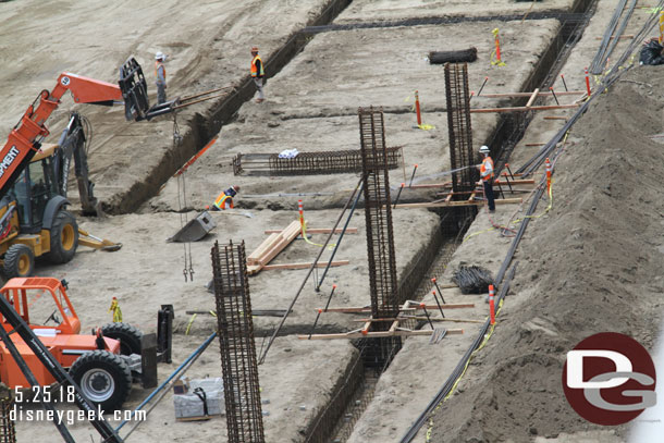 Then they come back and attach the next section of the column to the portion in the ground to extend the structure upward.