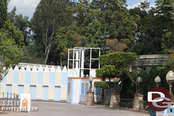 The facade around the parade gate by it's a small world is moving along very slowly.