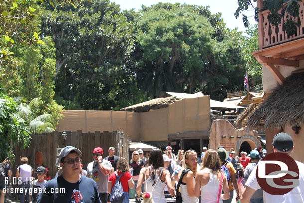 Walls up on the Jungle Cruise queue to block the view of the construction.