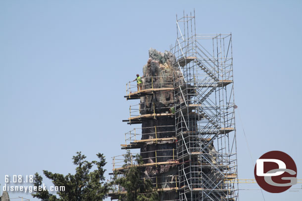 A worker up on the peak.  I would really like to see that view.