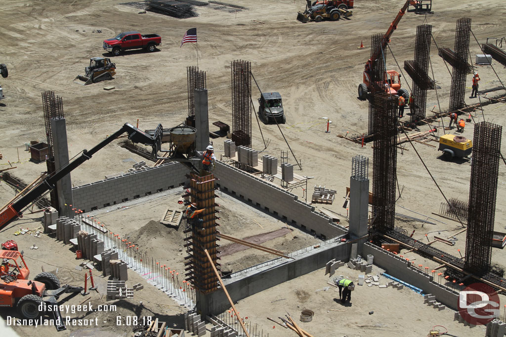 Pouring concrete into the form.